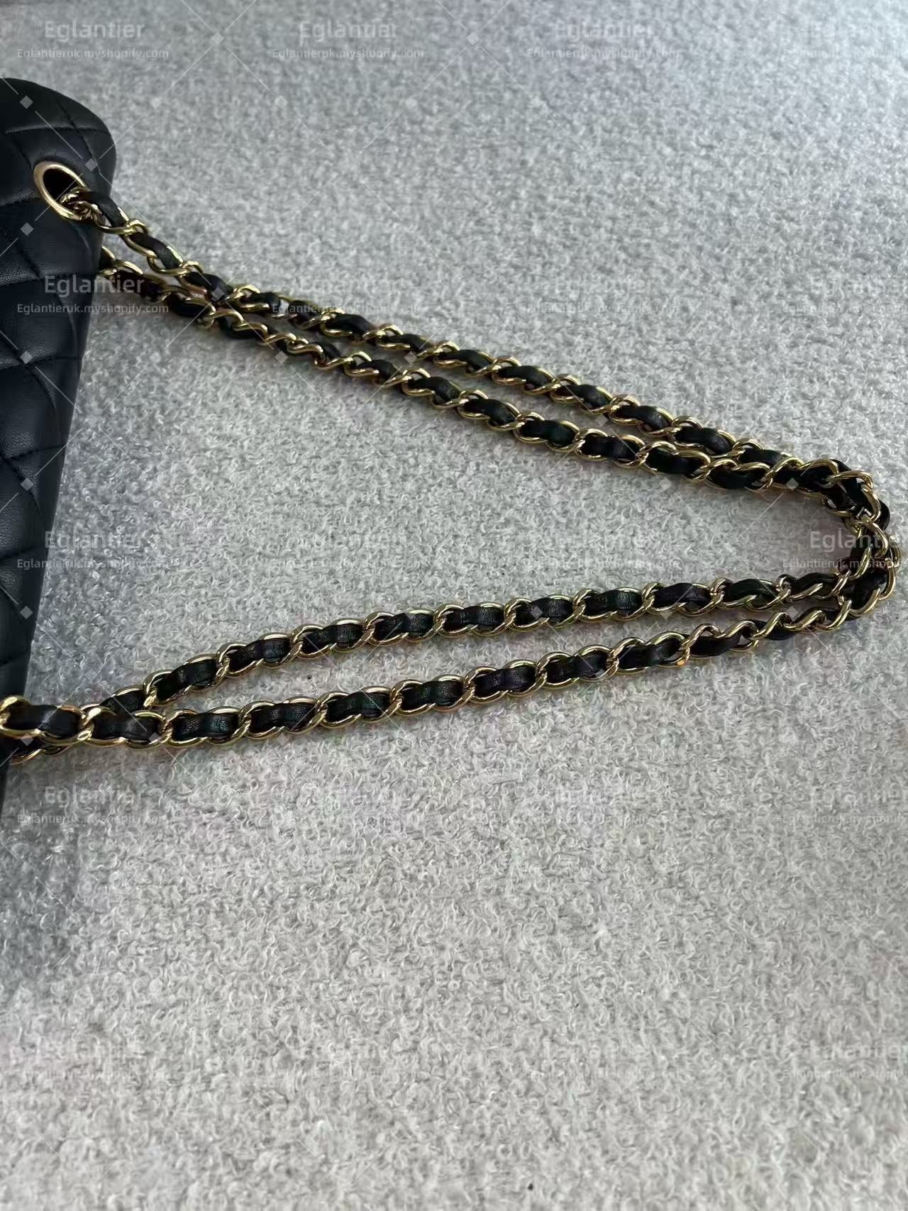 Chanel Timeless Classic double flap jumbo lambskin black gold hardware