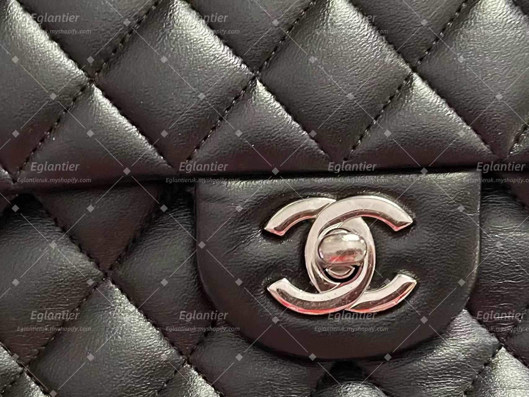 Chanel Timeless Classic double flap bag lambskin black medium silver hardware