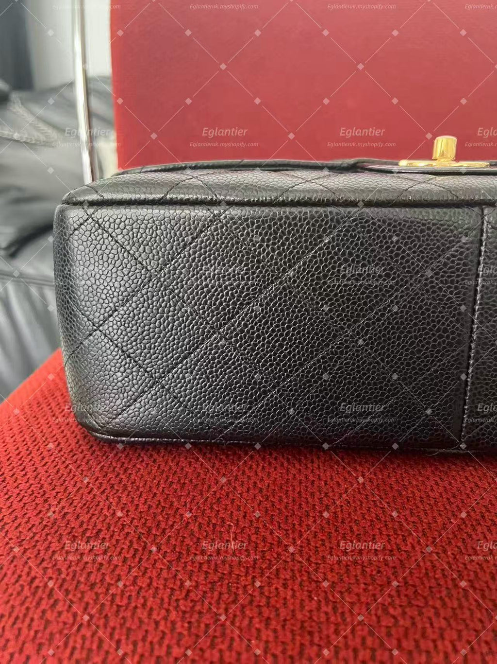 Chanel Timeless Classic double flap black jumbo caviar gold hardware