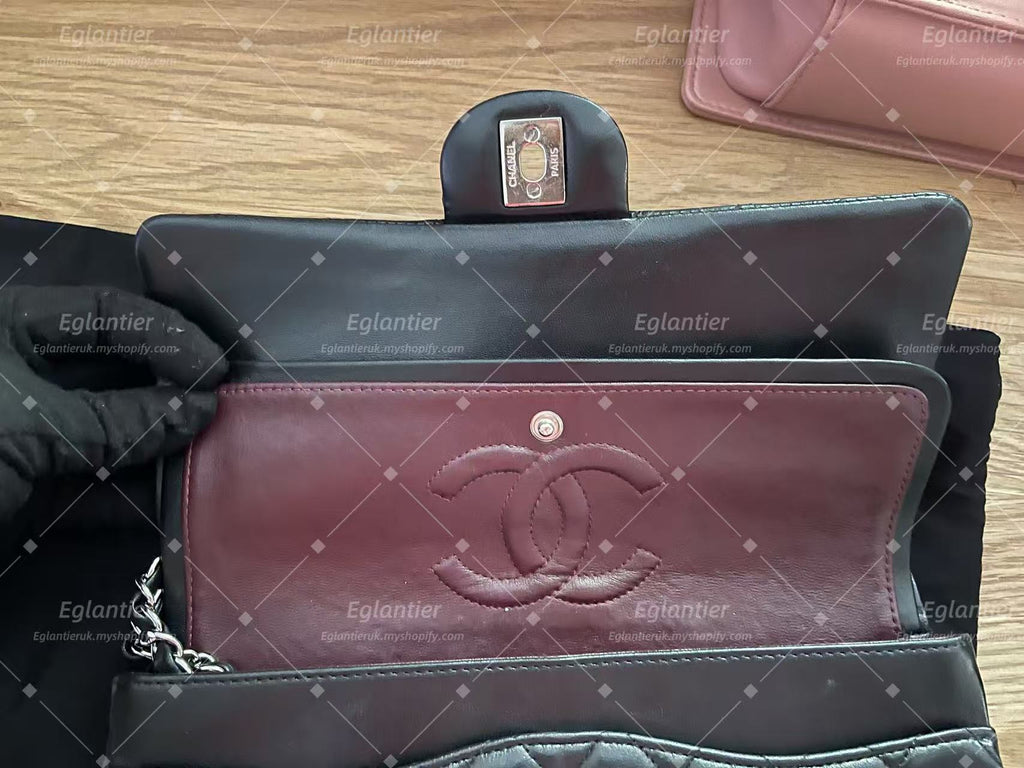 Chanel Timeless Classic double flap bag lambskin black medium silver hardware