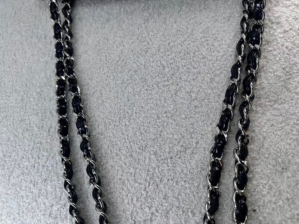 Chanel double flap bag black patent jumbo