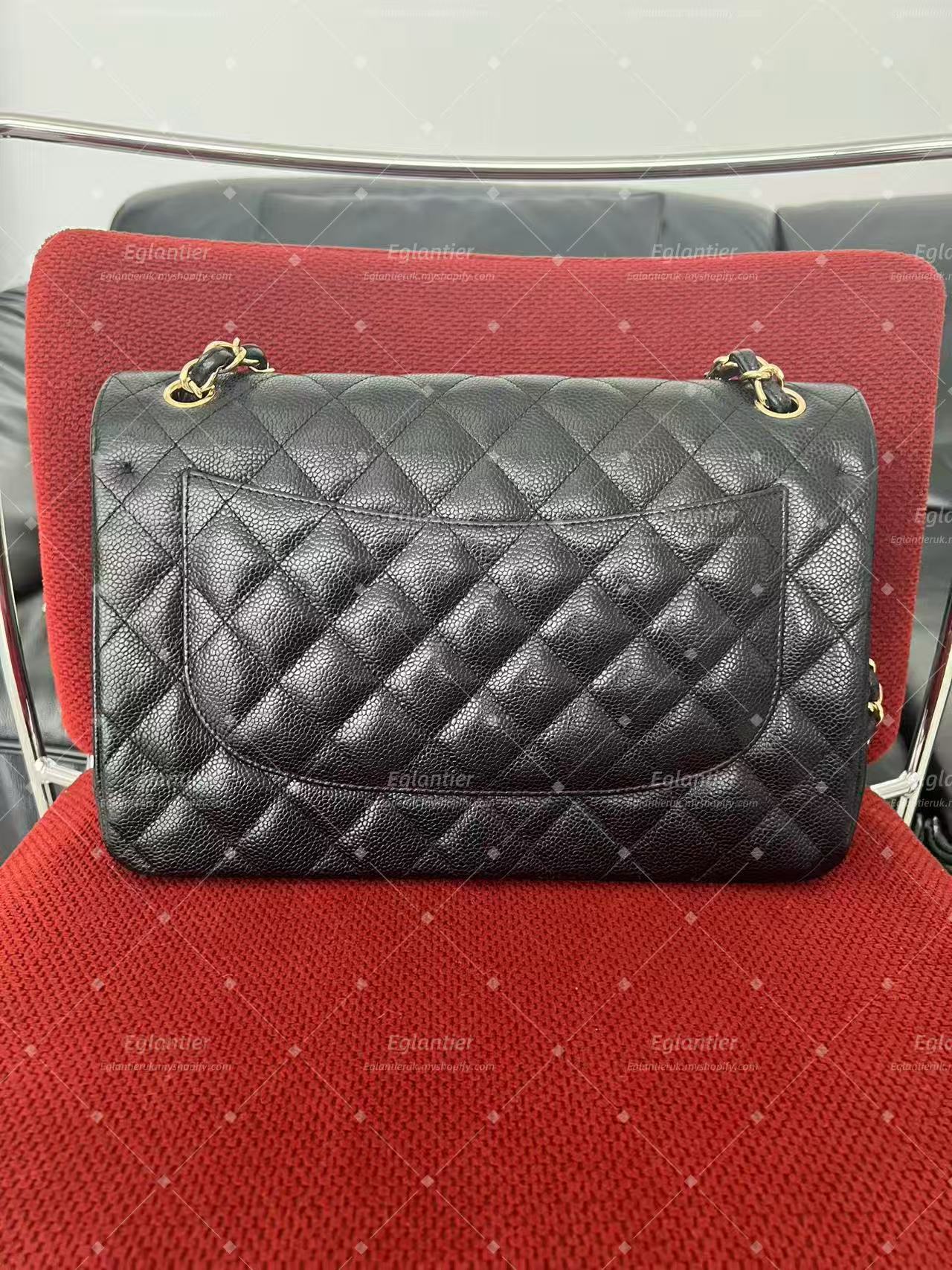Chanel Timeless Classic double flap black jumbo caviar gold hardware