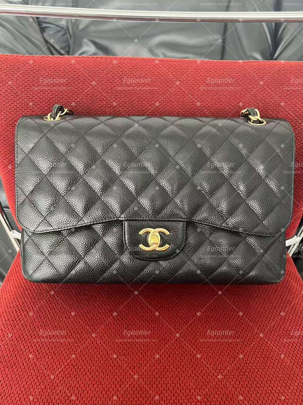 Chanel Timeless Classic double flap black jumbo caviar gold hardware
