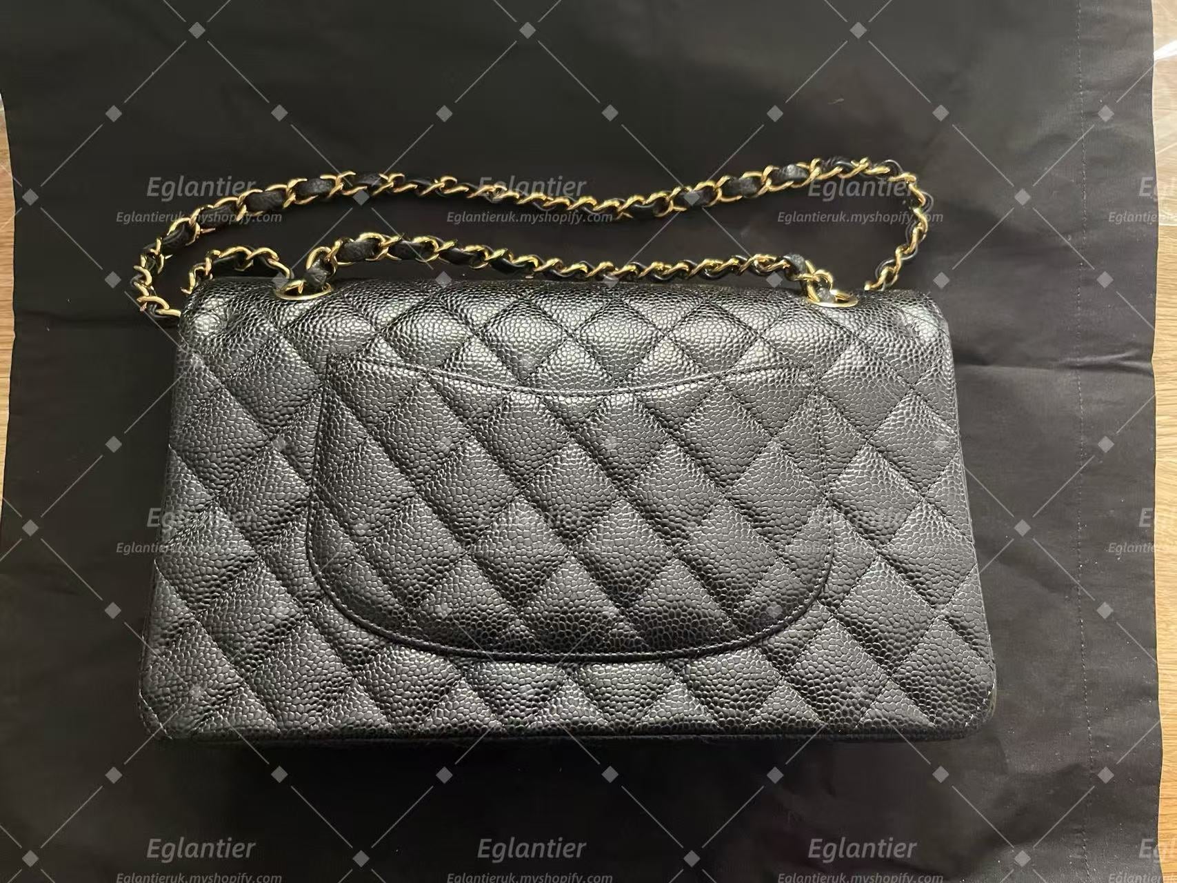 Chanel Timeless Classic double flap black medium caviar gold hardware microchip