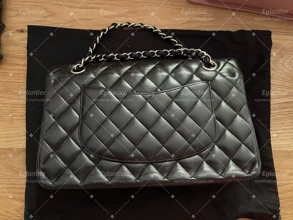 Chanel Timeless Classic double flap bag lambskin black medium silver hardware
