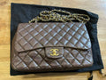 Chanel single flap bag Chocolate jumbo gold hardware lambskin