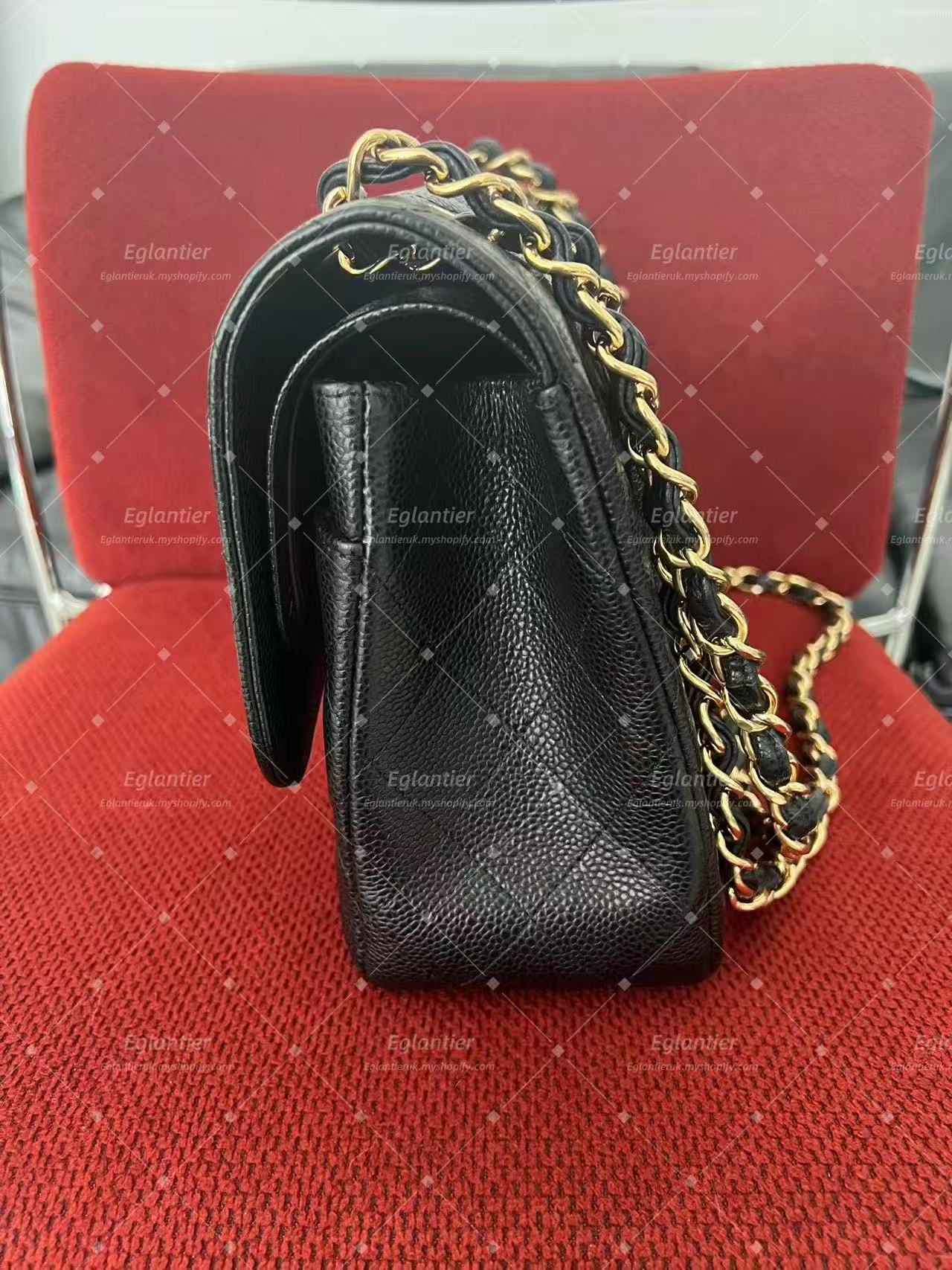 Chanel Timeless Classic double flap black jumbo caviar gold hardware