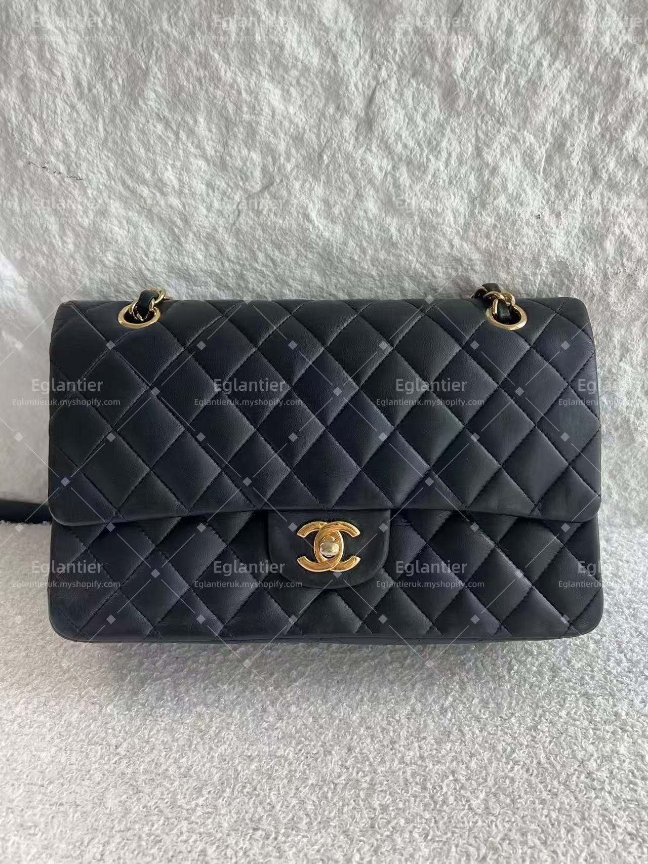 Chanel Timeless Classic double flap jumbo lambskin black gold hardware