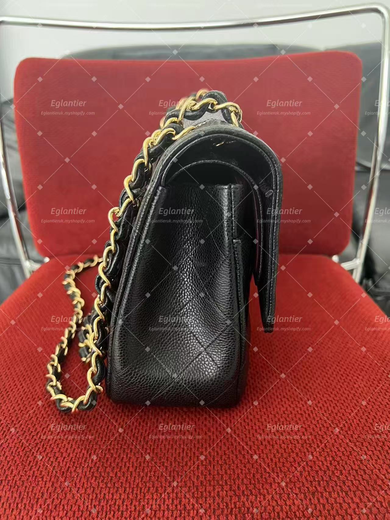 Chanel Timeless Classic double flap black jumbo caviar gold hardware