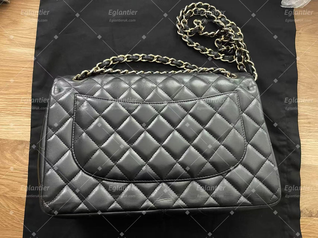 Chanel Timeless Classic double flap bag black jumbo gold hardware lambskin