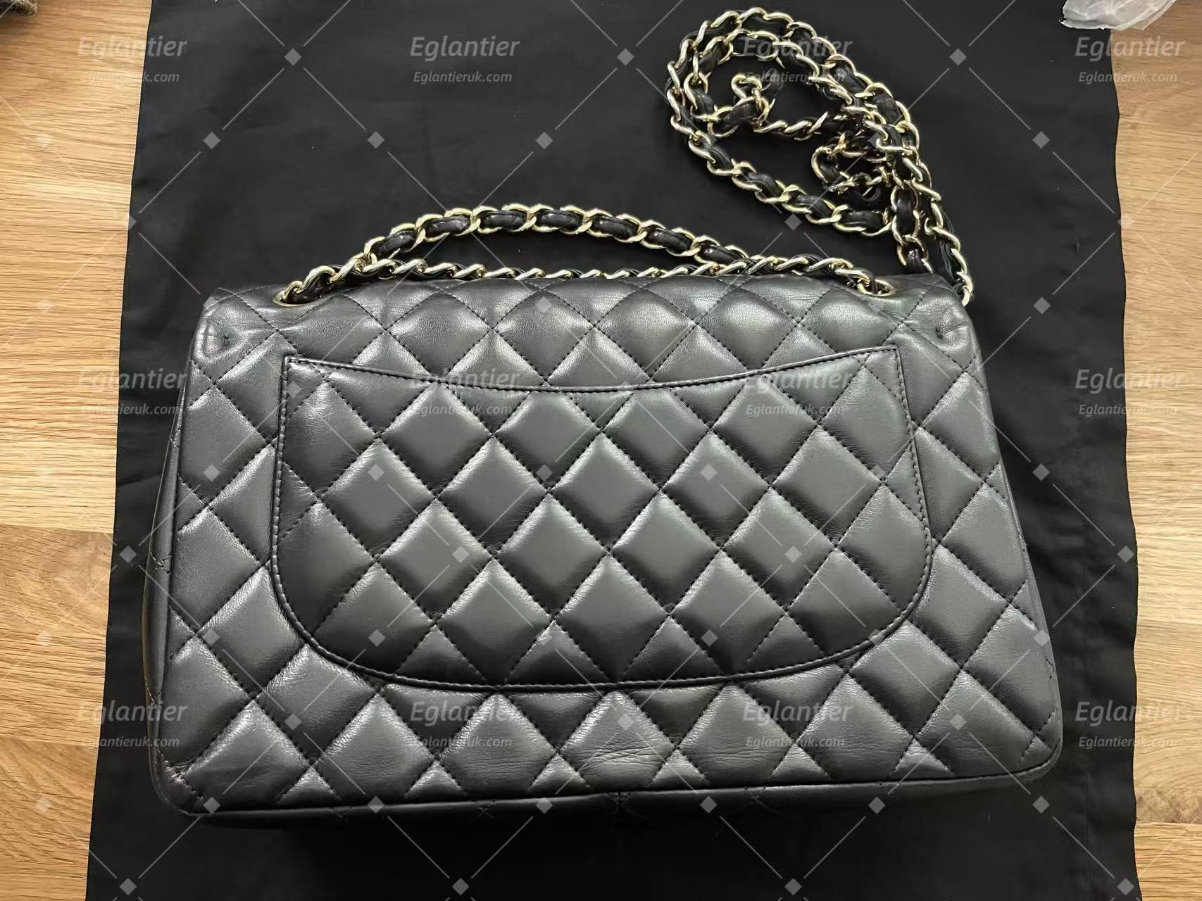 Chanel Timeless Classic double flap bag black jumbo gold hardware lambskin