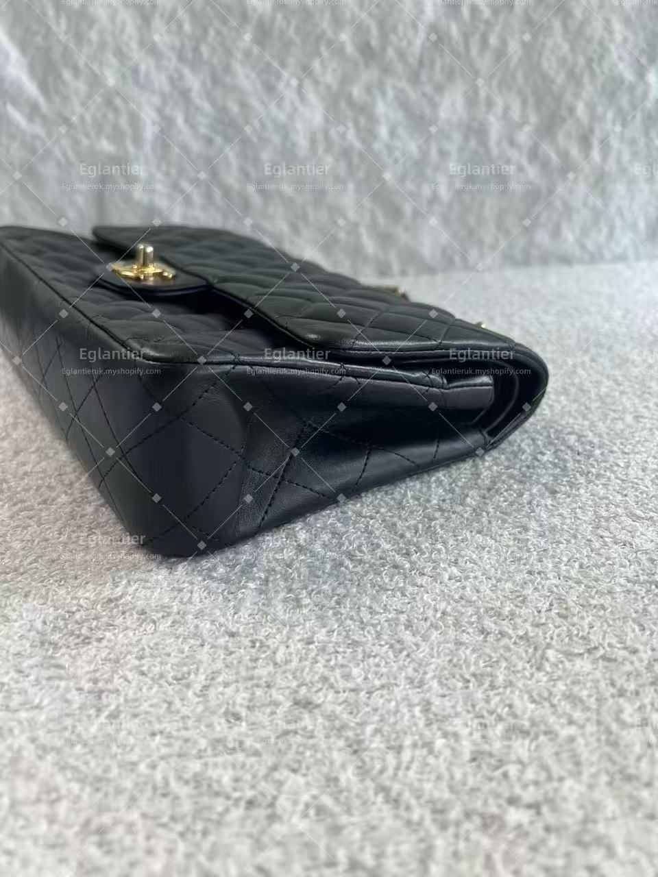 Chanel Timeless Classic double flap jumbo lambskin black gold hardware