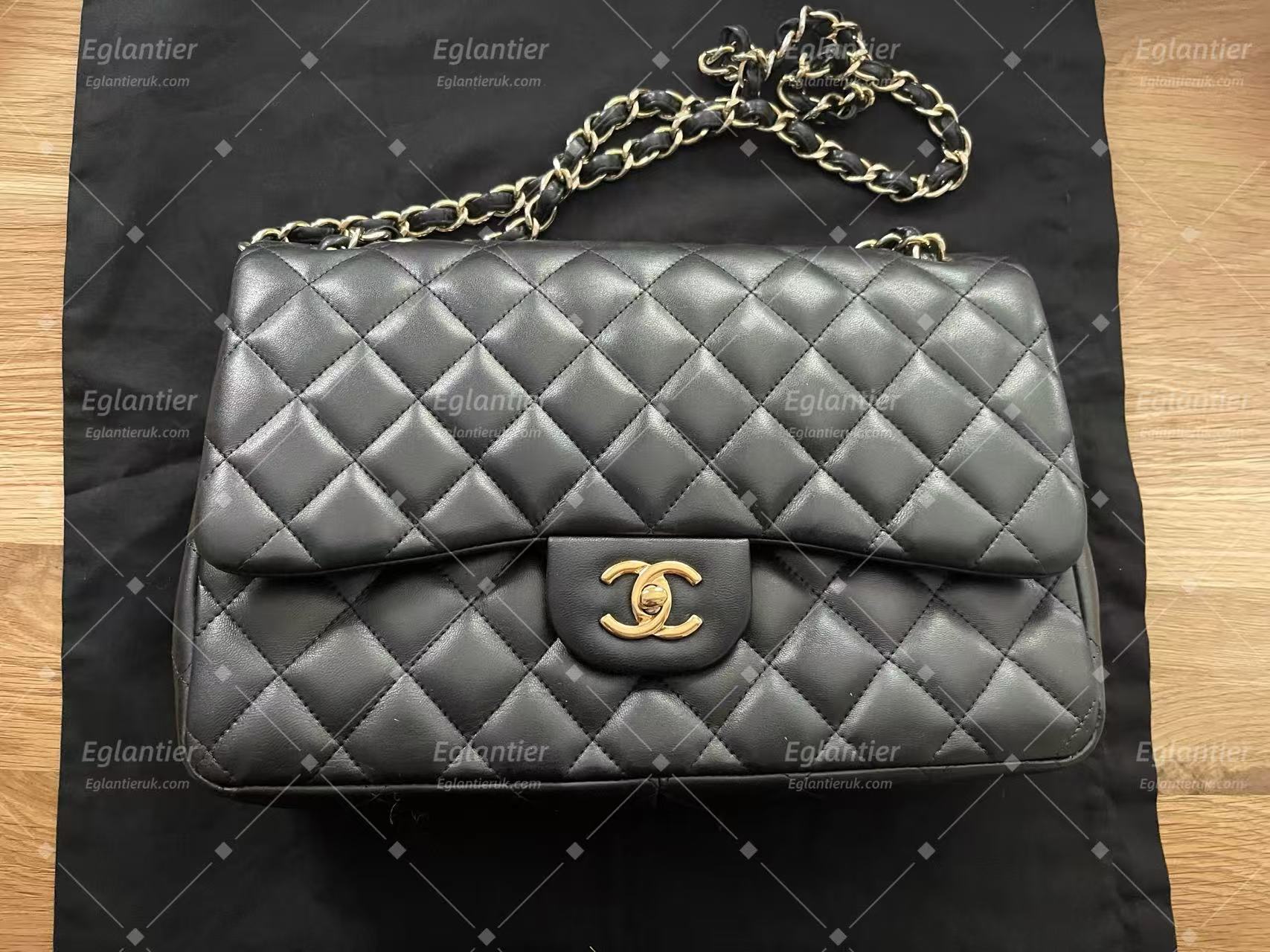 Chanel Timeless Classic double flap bag black jumbo gold hardware lambskin