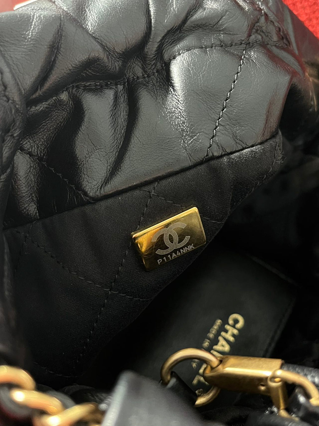 Chanel 22 bucket bag mini black shiny calfskin gold hardware