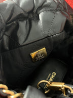 Chanel 22 bucket bag mini black shiny calfskin gold hardware