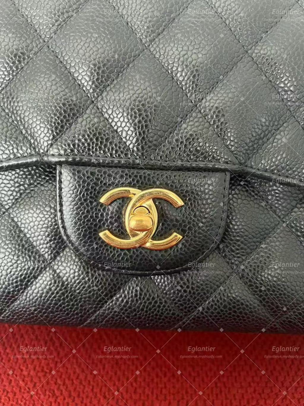 Chanel Timeless Classic double flap black jumbo caviar gold hardware