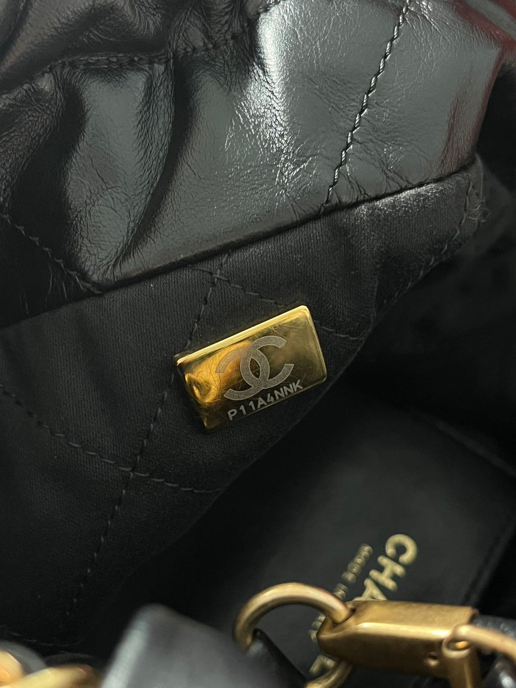 Chanel 22 bucket bag mini black shiny calfskin gold hardware