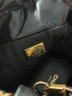 Chanel 22 bucket bag mini black shiny calfskin gold hardware