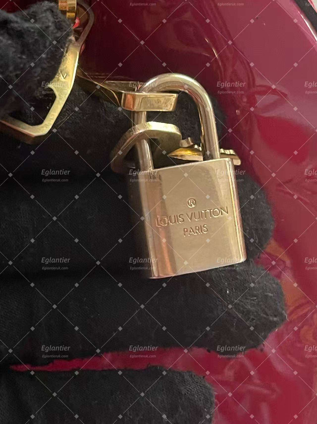 Louis Vuitton Speedy 30 Burgundy Patent Top Handle bag