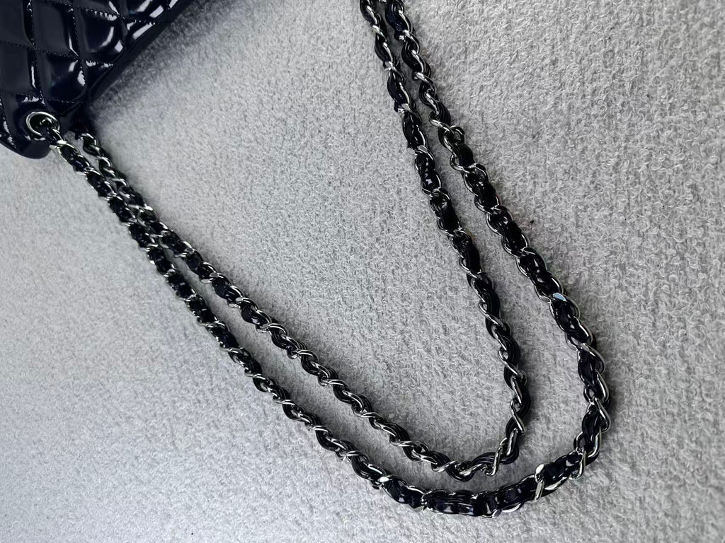 Chanel double flap bag black patent jumbo
