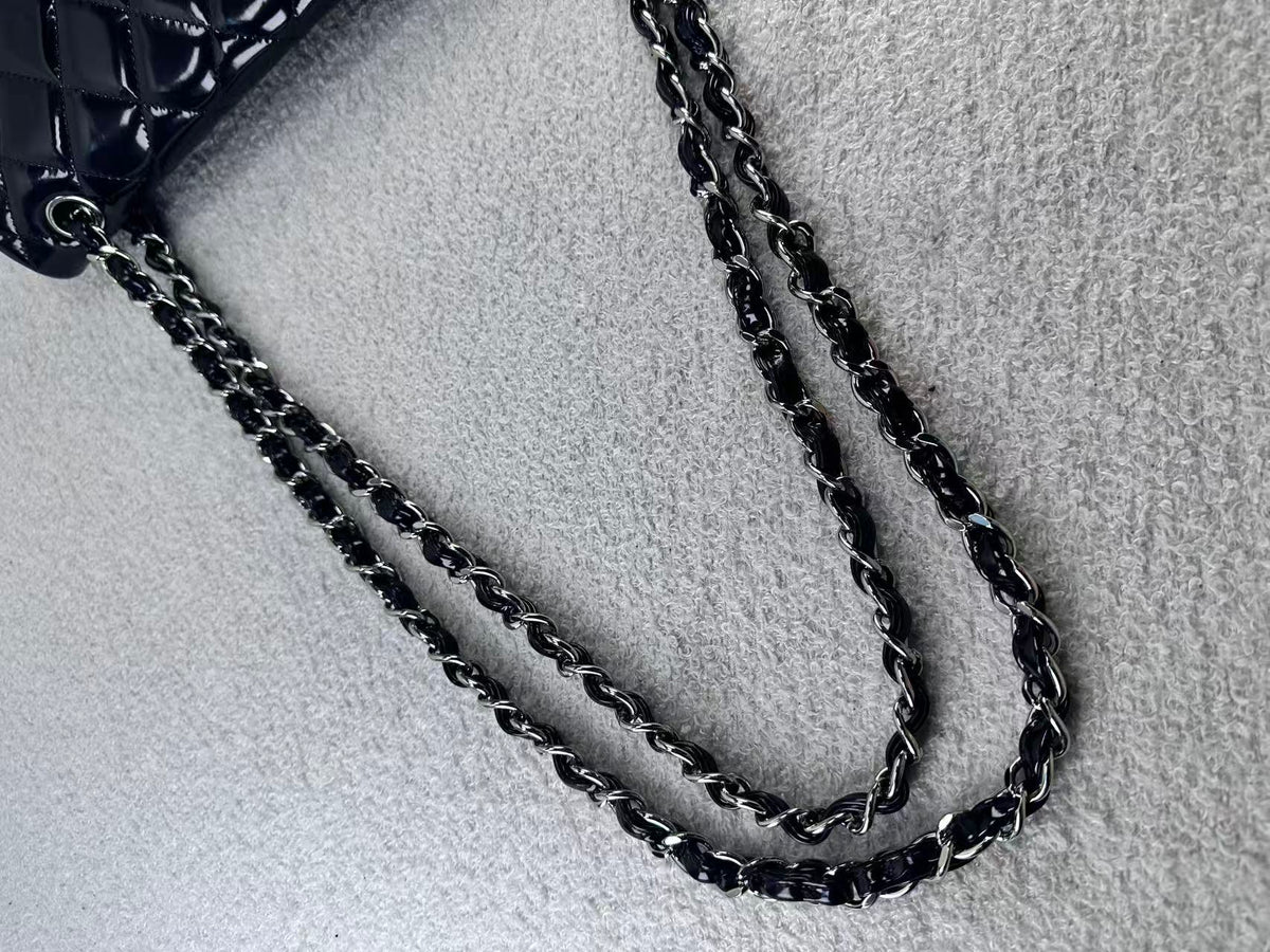 Chanel double flap bag black patent jumbo
