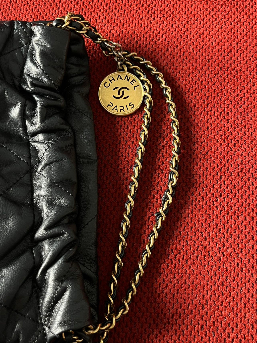 Chanel 22 bucket bag mini black shiny calfskin gold hardware