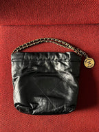 Chanel 22 bucket bag mini black shiny calfskin gold hardware