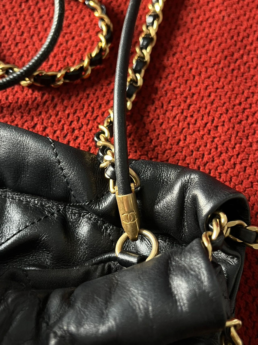 Chanel 22 bucket bag mini black shiny calfskin gold hardware