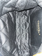 Chanel 22 bucket bag mini black shiny calfskin gold hardware