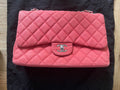 Chanel double flap bag red caviar jumbo silver gold hardware