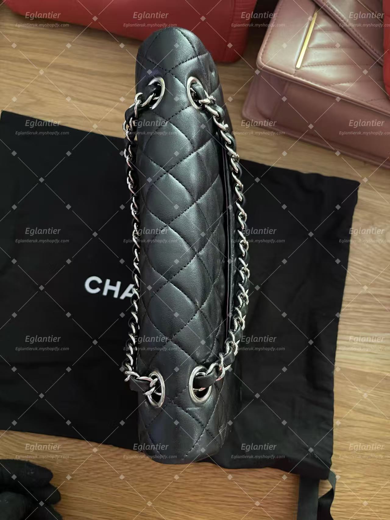 Chanel Timeless Classic double flap bag lambskin black medium silver hardware