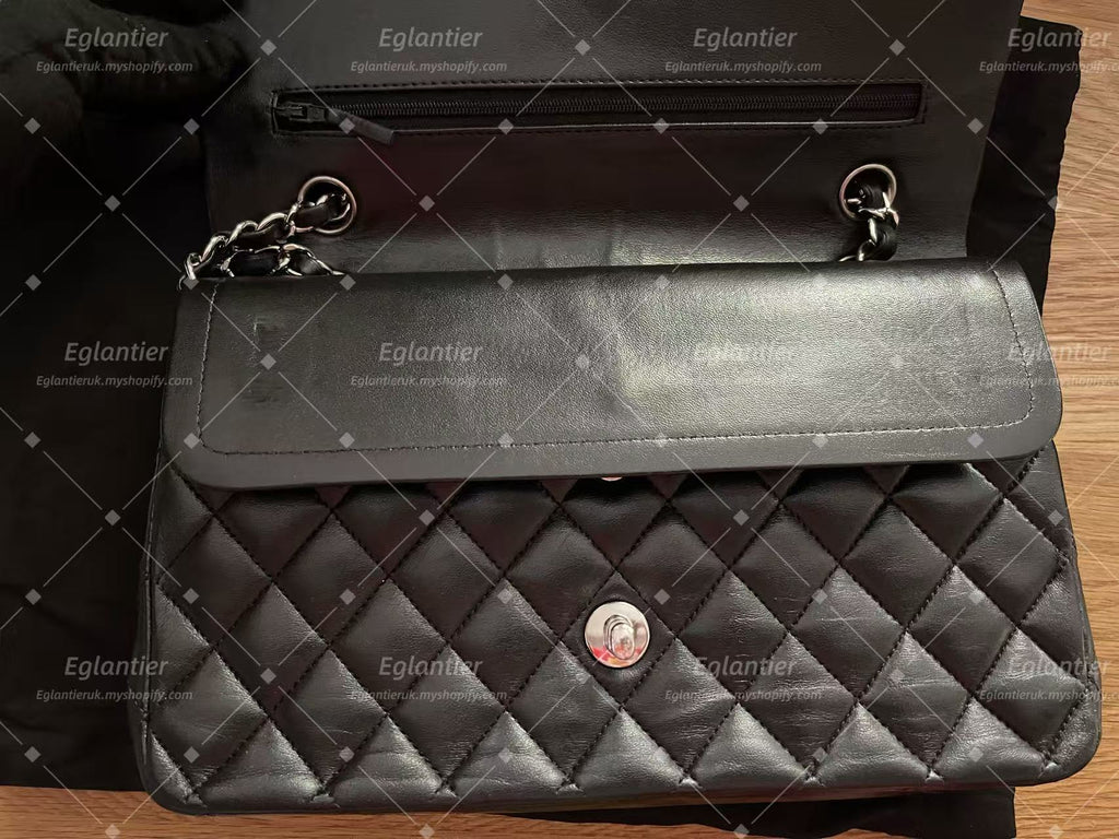 Chanel Timeless Classic double flap bag lambskin black medium silver hardware