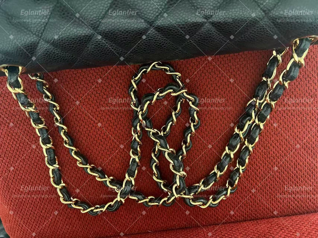 Chanel Timeless Classic double flap black jumbo caviar gold hardware
