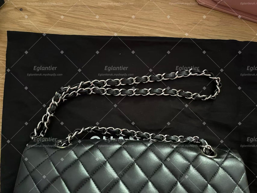 Chanel Timeless Classic double flap bag lambskin black medium silver hardware