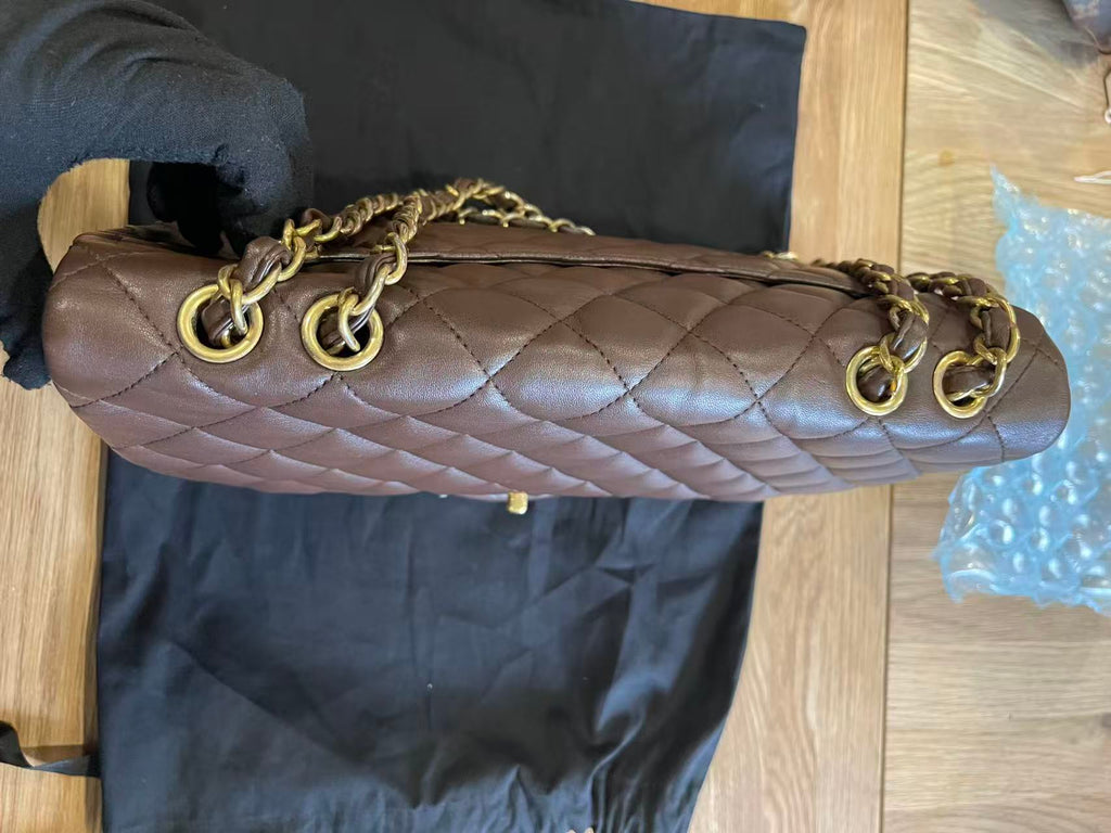 Chanel single flap bag Chocolate jumbo gold hardware lambskin
