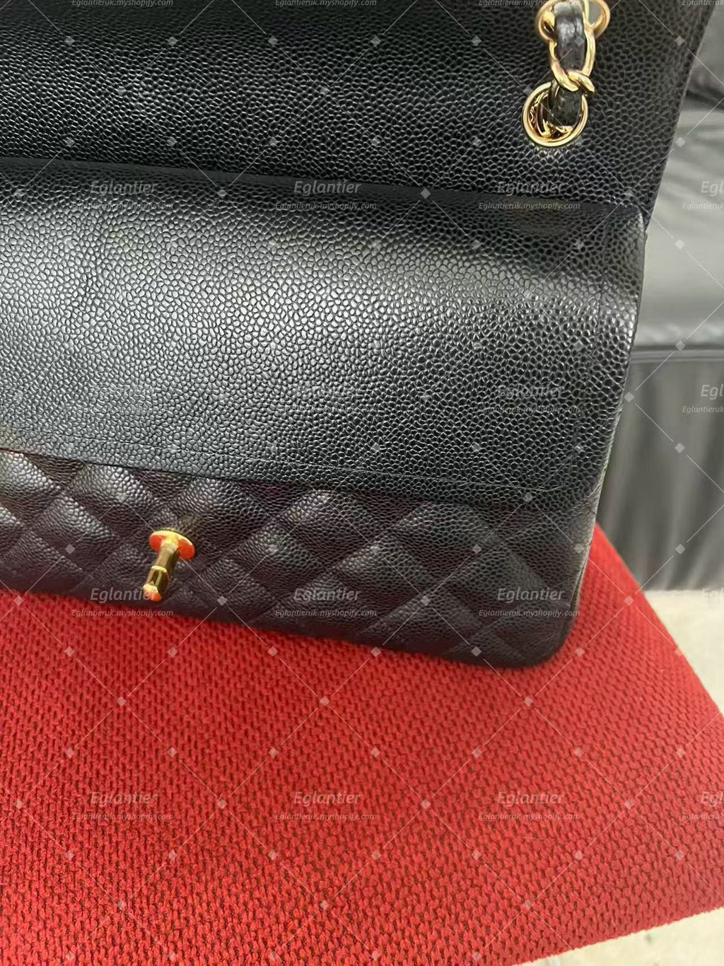 Chanel Timeless Classic double flap black jumbo caviar gold hardware