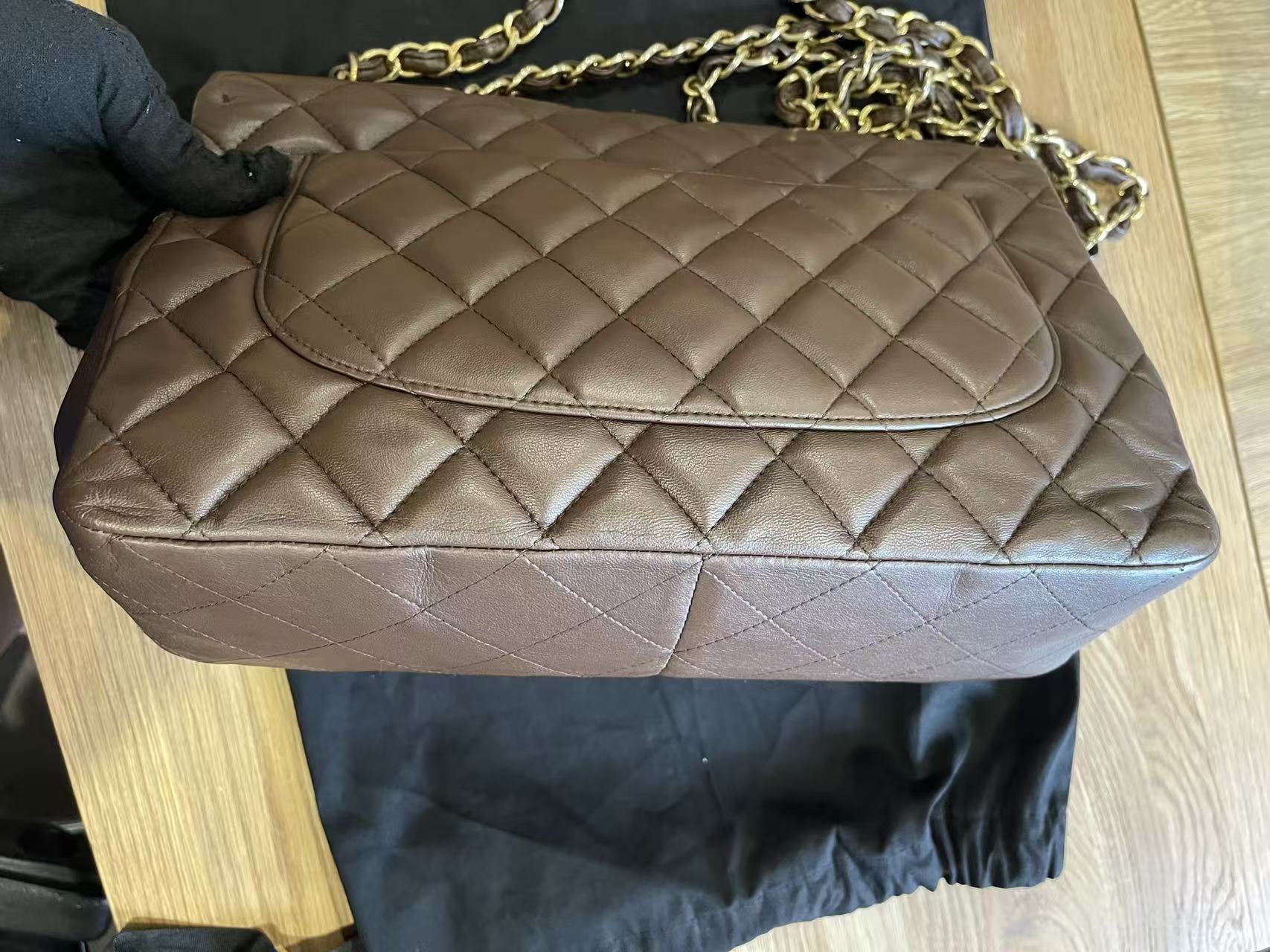 Chanel single flap bag Chocolate jumbo gold hardware lambskin