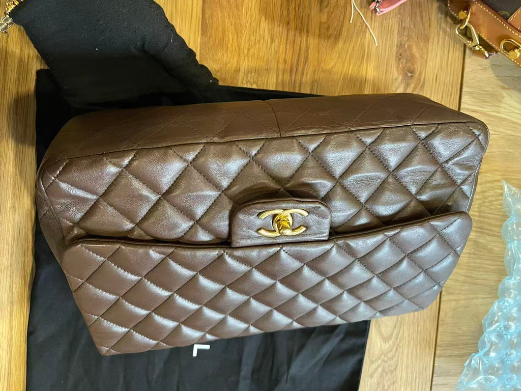 Chanel single flap bag Chocolate jumbo gold hardware lambskin