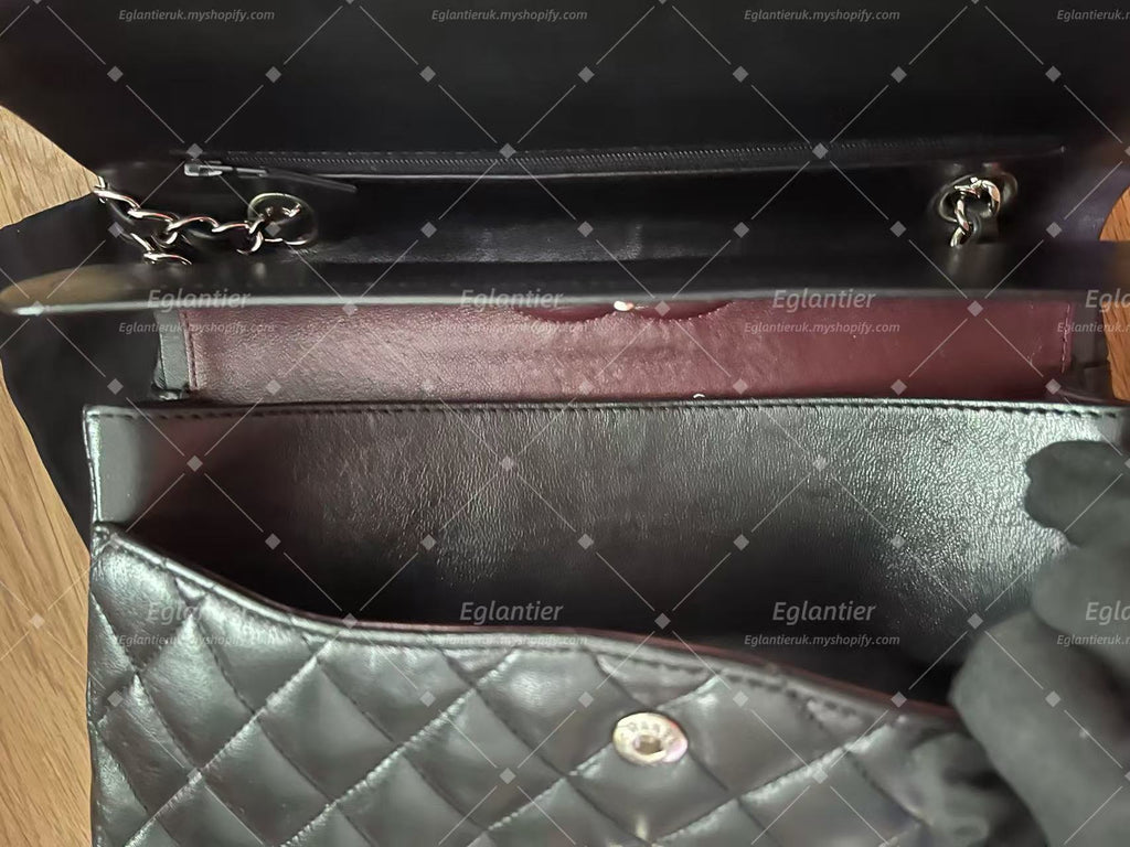 Chanel Timeless Classic double flap bag lambskin black medium silver hardware