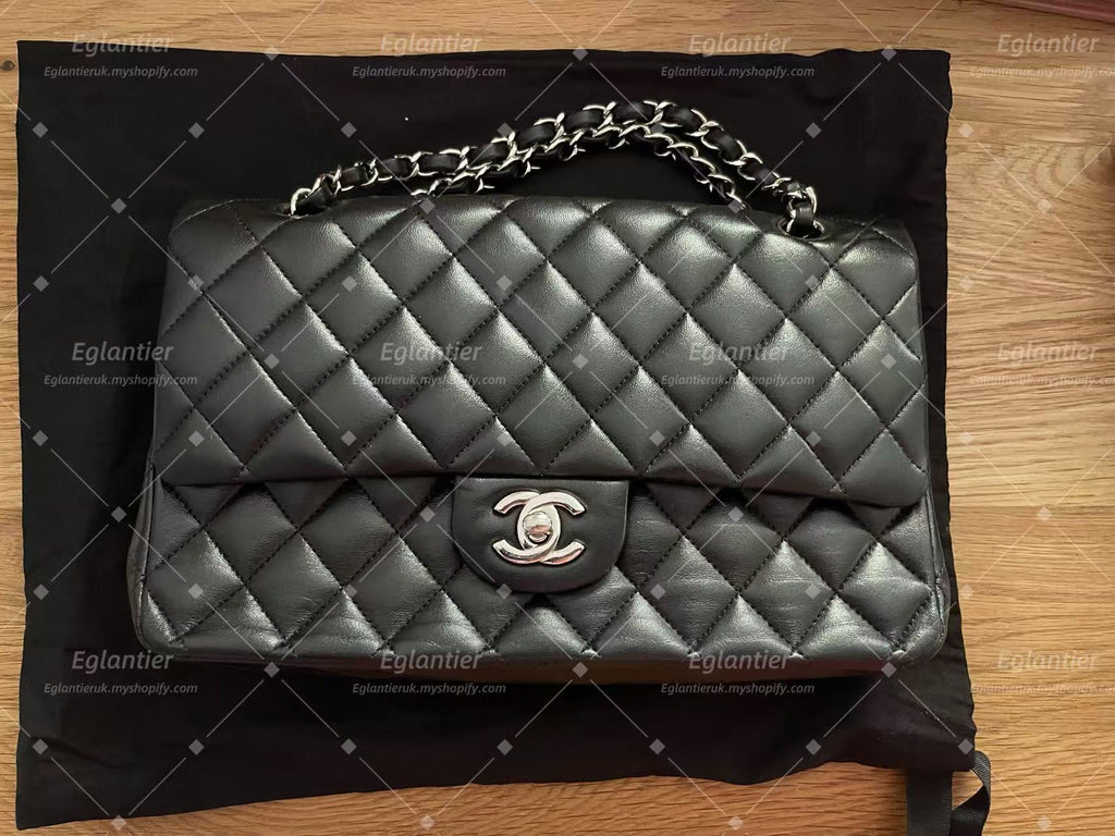 Chanel Timeless Classic double flap bag lambskin black medium silver hardware