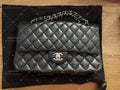 Chanel Timeless Classic double flap bag lambskin black medium silver hardware